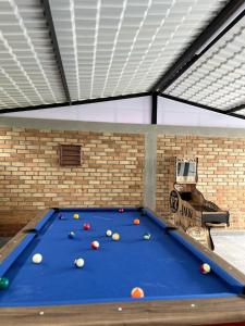 a large blue pool table in a room at Villa Verde in Popayan