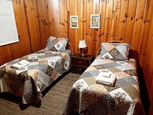 Postel nebo postele na pokoji v ubytování Cabin #2