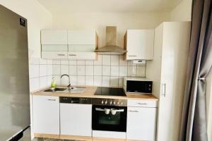 Kuchyň nebo kuchyňský kout v ubytování Ferienhaus Usedom Familie Stopp Haus 23