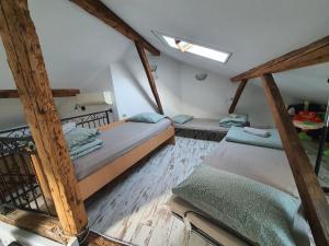 Ένα ή περισσότερα κρεβάτια σε δωμάτιο στο Guest House Old City Plovdiv