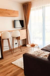 TV a/nebo společenská místnost v ubytování M&D Appartments