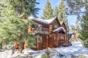a log cabin in the woods in the snow at 7 Mi to Northstar Resort Tahoe Vista Family Cabin in Tahoe Vista