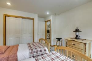 a bedroom with a bed and a wooden dresser at 7 Mi to Northstar Resort Tahoe Vista Family Cabin in Tahoe Vista