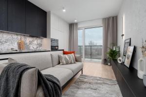 Istumisnurk majutusasutuses Apartamenty Falista Łódź Retkinia