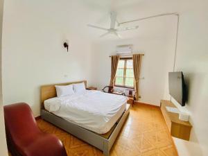 Μια τηλεόραση ή/και κέντρο ψυχαγωγίας στο Khách sạn Dòng Sông Xanh