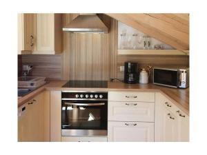 Kuchyň nebo kuchyňský kout v ubytování Holiday apartment with 2 bedrooms + 18 fotografií