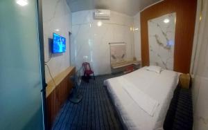 Giường trong phòng chung tại Mai homestay