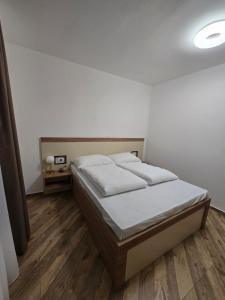 Ένα ή περισσότερα κρεβάτια σε δωμάτιο στο Vila La Familia