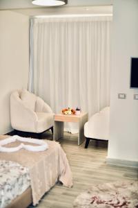 Χώρος καθιστικού στο Legend Pyramids Inn +26 φωτογραφίες