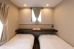 Postel nebo postele na pokoji v ubytování Quiet family-friendly lodging