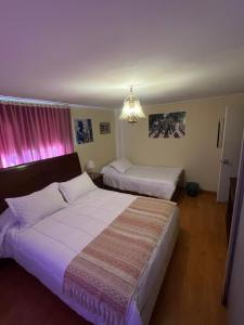 Postel nebo postele na pokoji v ubytování La Ruta del Jazz