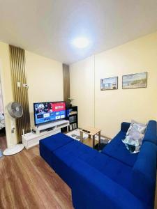 Μια τηλεόραση ή/και κέντρο ψυχαγωγίας στο Secure & Serene 2 Bedrooms Townhouse with Parking +12 φωτογραφίες