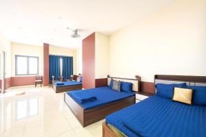 a bedroom with two beds in a room at Dũng Quyến Homestay in Danang