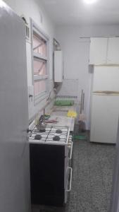 Η κουζίνα ή μικρή κουζίνα στο Departamento al frente