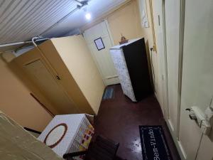 an overhead view of a room with a refrigerator at Aluguel temporada in Ouro Preto