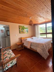 Ένα ή περισσότερα κρεβάτια σε δωμάτιο στο Hotel Casa Grande