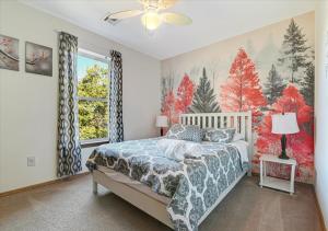 a bedroom with a bed and a large window at Lakefront Kayaks, HotTub FirePit Sauna Pool in East Stroudsburg +71 photos