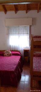 Ένα ή περισσότερα κρεβάτια σε δωμάτιο στο Duplex Mar del tuyu