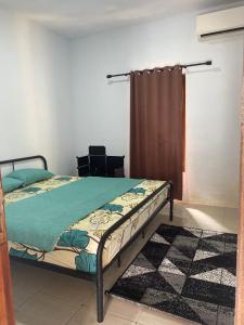 Postel nebo postele na pokoji v ubytování Batukaras beach hill