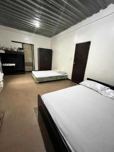 Ένα ή περισσότερα κρεβάτια σε δωμάτιο στο Esma Residence