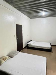 Ένα ή περισσότερα κρεβάτια σε δωμάτιο στο Esma Residence