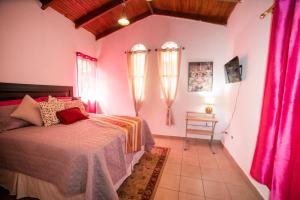 Postel nebo postele na pokoji v ubytování La casita de Lunaté