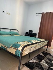 Postel nebo postele na pokoji v ubytování Batukaras beach hill