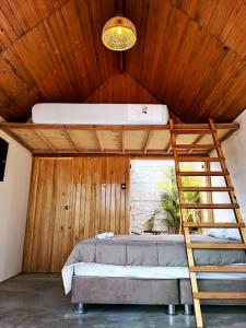 ウアラルにあるMandarhemia Clubのベッドルーム1室(二段ベッド1組、はしご付) +25枚の写真