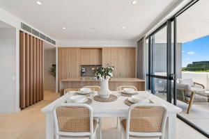 Φωτογραφία από το άλμπουμ του 409 at CODA - City Convenience Meets Coastal Ease σε Κοφς Χάρμπορ +18 φωτογραφίες