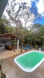 Swimmingpoolen hos eller tæt på Casa Chamego do Morro Vale do Capão
