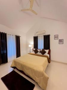 Ένα ή περισσότερα κρεβάτια σε δωμάτιο στο Grassland Voyages