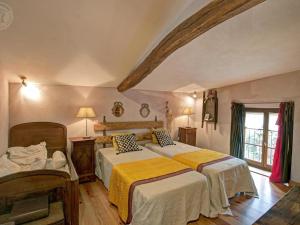 Postel nebo postele na pokoji v ubytování Gîte de charme avec jardin privé et animaux acceptés - FR-1-496-183