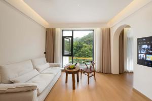 Μια τηλεόραση ή/και κέντρο ψυχαγωγίας στο Shambhala Hotel of Zhangjiajie