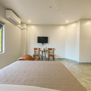 TV a/nebo společenská místnost v ubytování Như Ý Hotel Hà Giang