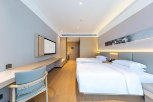 Fotografie z fotogalerie ubytování Jin Yi Hotel Chifeng Victoria Mall Hongshan Government Branch v destinaci Liu-tao-fen