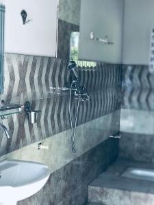 Koupelna v ubytování Hidden leaf Guesthouse