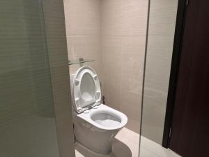 a bathroom with a toilet with the seat up at Room in The Title Rawai Phase 1,2, Condo in Rawai, Room in Rawai, Room in The Title Rawai in Rawai Beach