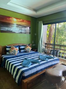 Ένα ή περισσότερα κρεβάτια σε δωμάτιο στο The view Hostel