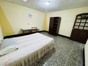 Postel nebo postele na pokoji v ubytování El rincón de Rosa