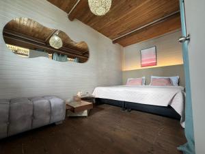 Postel nebo postele na pokoji v ubytování El Arca