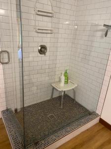 a shower with a glass door and a sink at Delightful Vacation Rental for Group Getaway in Polk County, Tennessee in Reliance +16 photos