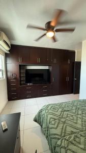 Ένα ή περισσότερα κρεβάτια σε δωμάτιο στο Encantador y cómodo departamento en Linda Vista HI +18 φωτογραφίες