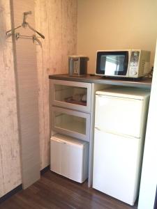 Kuchyň nebo kuchyňský kout v ubytování Bar 39