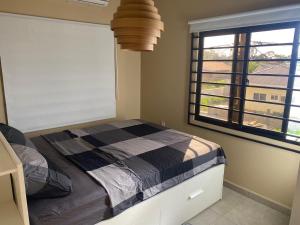 Postel nebo postele na pokoji v ubytování Sissa Omi Apartments