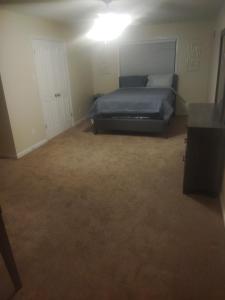 Ένα ή περισσότερα κρεβάτια σε δωμάτιο στο Marion Getaway +1 φωτογραφίες