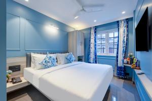 Ένα ή περισσότερα κρεβάτια σε δωμάτιο στο Vibe House - A Boutique Stay +60 φωτογραφίες