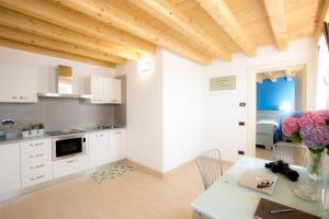 Η κουζίνα ή μικρή κουζίνα στο Casa Sansovino +81 φωτογραφίες