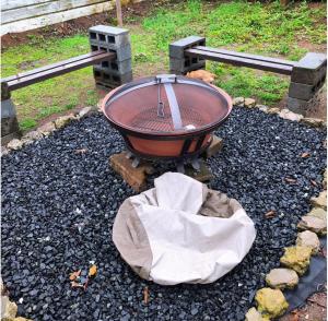 a fire pit sitting on a bunch of rocks at Yayunaturals 1 in Panama City