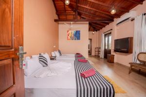 TV a/nebo společenská místnost v ubytování Villa Red Lobster