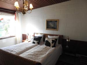 Ένα ή περισσότερα κρεβάτια σε δωμάτιο στο 2-person room in a hotel in Tranekær +34 φωτογραφίες